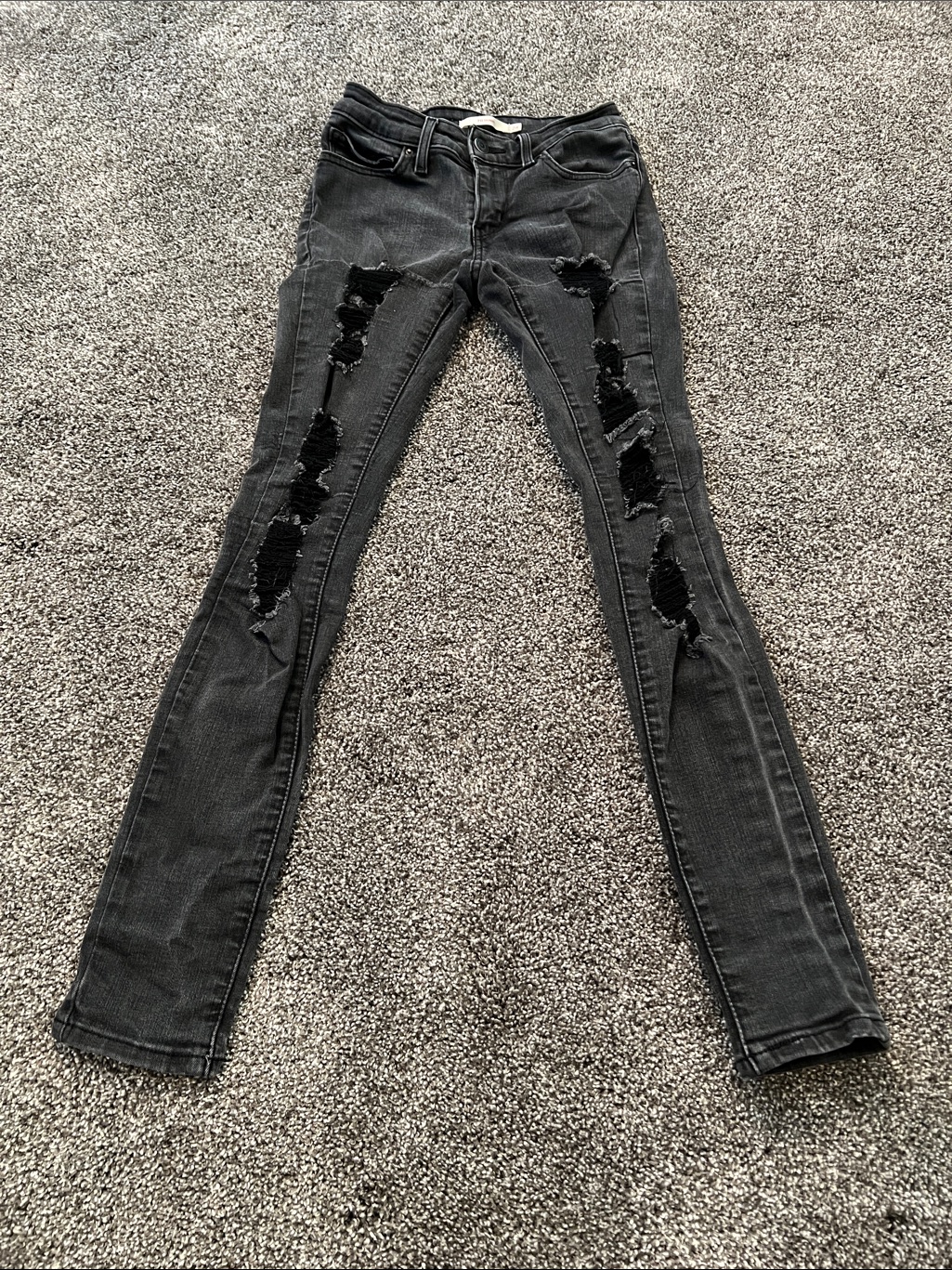 Levi’s Black Distressed Skinny Jeans With Thigh And Knee Rips